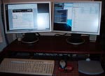 Photograph of my two new widescreen monitors.